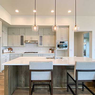 Kitchen---Perimeter-Cabinets-Painted-Useful-Gray---Island-Stained-BAC-Charcoal